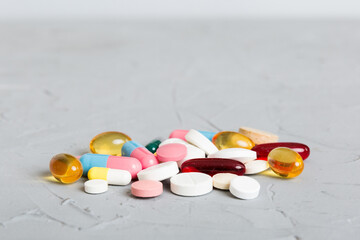 Wall Mural - Collection Of Various Medical Tablets And Pills. Assorted pharmaceutical medicine pills, tablets and capsules on table background. Heap of assorted various medicine tablets. Health care