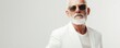 © Svitlana - Fashionable elderly man in modern white outfit, posing with sunglasses against a minimalist white background, showcasing contemporary style and individuality