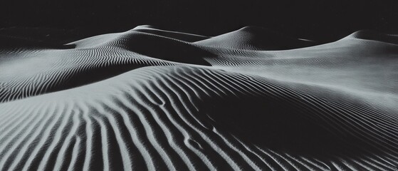 Poster - Wind-sculpted desert dunes create intricate patterns and shadows under the sun
