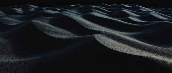 Poster - Subtle texture of fine black sand creates a unique desert landscape illuminated by soft light