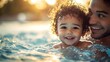 © Wilasinee - Close up of a parent and child practicing swimming together in a pool with the parent providing encouragement care and support as they share a joyful playful moment of bonding and learning