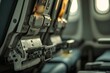 © Jennie Pavl - Detailed View of Airplane Seat Mechanism