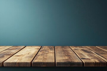 Poster - A rustic wooden tabletop against a smooth, muted blue wall, creating a warm and inviting atmosphere for display or decoration.