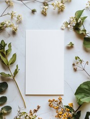 Aufkleber - Blank canvas surrounded by fresh flowers and green leaves on a light background for creative design or stationery mock up. Generative AI