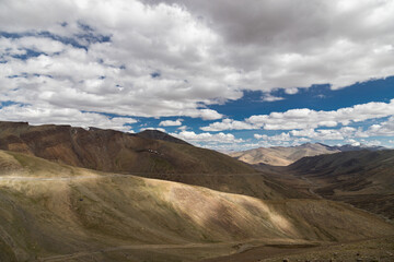 Wall Mural - View of beautiful himalayan mountains at taglang la, passing through the keylong-leh road, elevation 5,328 metres, is a high altitude mountain pass in the Indian union territory of Ladakh.