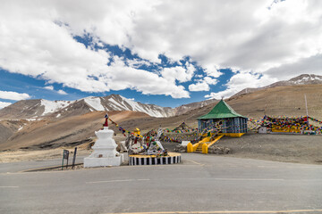 Wall Mural - View of beautiful himalayan mountains at taglang la pass and shree krishna temple, passing through the keylong-leh road, in Ladakh, India.