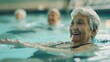 © Studicon - A woman in a black bathing suit is swimming in a pool