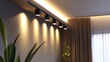 © Intach - Wall-mounted lighting equipment in a living room, featuring sleek spotlights under the ceiling and a modern track LED-lighting system