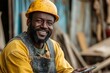 © Dipika - Happy manual worker working on touchpad at construction site and looking at camera. Generative AI