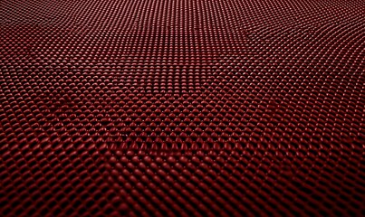 Red textured surface with repeating pattern, ideal for backgrounds or abstract designs