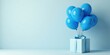 © yut - A Light Blue Gift Box with a Sky Blue Ribbon and Balloons Floating Above