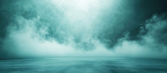 Poster - Misty atmospheric background with soft light illuminating low clouds and a calm water surface Copy Space