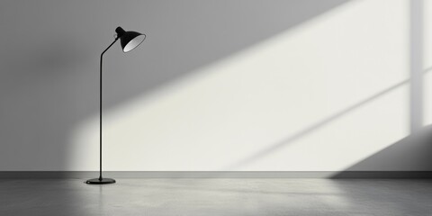 Poster - Modern floor lamp casting shadows on a minimalist empty room with white walls and concrete flooring Copy Space
