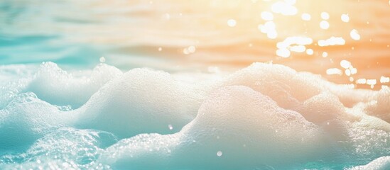 Poster - foamy waves on a tranquil water surface with warm sunlight reflections and copy space for text addit