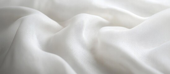 Poster - Soft white satin fabric texture with smooth draping and gentle folds ideal for backgrounds or textile design Copy Space