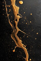 Poster - A vibrant splash of gold paint creating dynamic patterns against a black background.