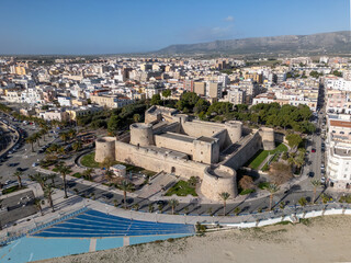 aerial drone view of the fortress and coastal town of manfredonia in puglia, italy.