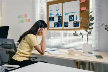 Poster - Stressed businesswoman at desk overwhelmed by work, feeling tired and frustrated while analyzing data on laptop. Image shows burnout in corporate world, emphasizing stress management