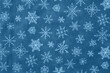 © Karen Roach - A festive background with snowflakes on a blue wintery pattern. Perfect for holiday designs and seasonal projects