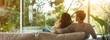 © carballo - young couple relaxing on sofa at home or apartment