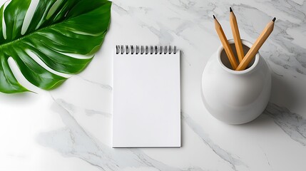 Poster - Blank Notepad Mockup with Pencils and Tropical Leaf on Marble Desk