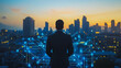 © Teeraphon - abstract, business, team, stands, peak, success, Abstract business man stands on the peak of success amid tall, innovative Smart city and graphs with statistics to analyze business potential and predi