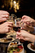 © Евгений Вершинин - Cheers to a Fantastic Celebration Friends Joyfully Toasting with Wine Glasses in Hand