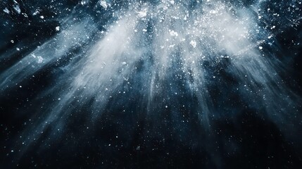 Wall Mural - Abstract blue and white powder explosion on black background, illuminated by light rays.