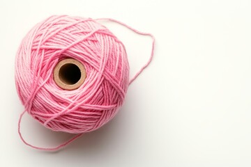 Wall Mural - Knitting yarn in pink, isolated on a white background