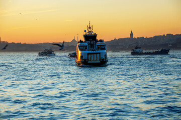 Wall Mural - boats and ships at sunset  in the bosphorus in istanbul, constantinople