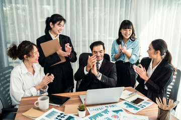 Poster - Diverse group of business analyst team analyzing financial data report paper on office table. Chart and graph dashboard by business intelligence analysis for strategic marketing planning Habiliment