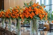 © Minerva Studio - Orange roses decorating elegant restaurant for a special event