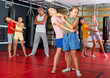 © JackF - Young children working in pair mastering new self-defense moves at gym