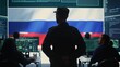 © DC Studio - Russian military personnel in high tech government office spreading fake news and hybrid warfare propaganda, making threats. Russian army private stealing classified information from rivals. Camera B.