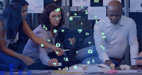 Poster - Image of network of connections with icons over diverse colleagues brainstorming in office