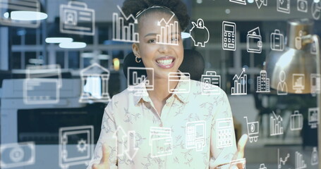 Poster - Image of business icons and data processing over african american businesswoman in office