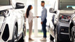 © Prostock-studio - Unrecognizable young middle eastern man and woman shaking hands at newest auto showroom, blurred background. Customer buying brand new luxury car at automobile dealership salon