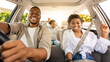© Prostock-studio - Black Family Riding Car Traveling Together In Summer, Smiling To Camera. Parents And Preteen Daughter Sitting In New Automobile. Auto Ownership And Purchase Concept. Selective Focus