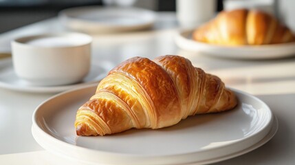 Wall Mural - Croissants in white plates, closeup