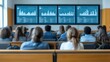 © Adit - Audience viewing data charts on large screen.