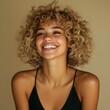 © freestockimg - Photo of a Smiling Woman with Curly Hair