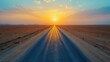 © huang - Aerial view of the long desert road in the expansive Arabian landscape, without any objects or people. The shot is taken from above by a drone, showing an endless, straight highway with no other signs
