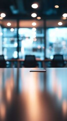 Poster - A table with a laptop on it and a chair in the background. The table is empty and the chair is not in use
