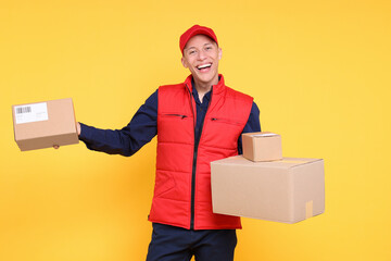 Poster - Happy postman with parcels on yellow background