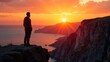 © Sergei - A guy stands on the edge of a cliff admiring the sunset, free space for text