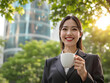 © Design Haven - Portrait of a businesswoman standing in a a modern office,Confident businesswoman in modern office,Smiling businesswoman at work,Mature female CEO with arms crossed