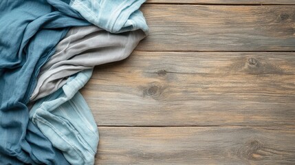 Poster - Textured wooden surface with soft fabric draped on one side providing Copy Space for design elements or text placement.