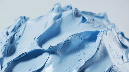 Poster - Abstract close-up of textured blue paint resembling icy mountains with smooth gradients and Copy Space for creative use.