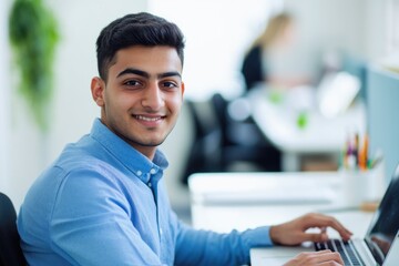 Poster - A person sitting in front of a laptop with a thoughtful expression, ideal for illustrating digital work or study