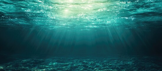 Poster - Underwater scene with sunlight rays penetrating water surface and creating a gradient effect, Copy Space available.